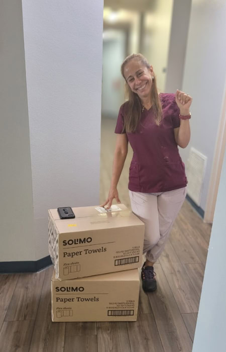 Two boxes of paper towels, donated by a grateful client. We are thankful for every contribution.